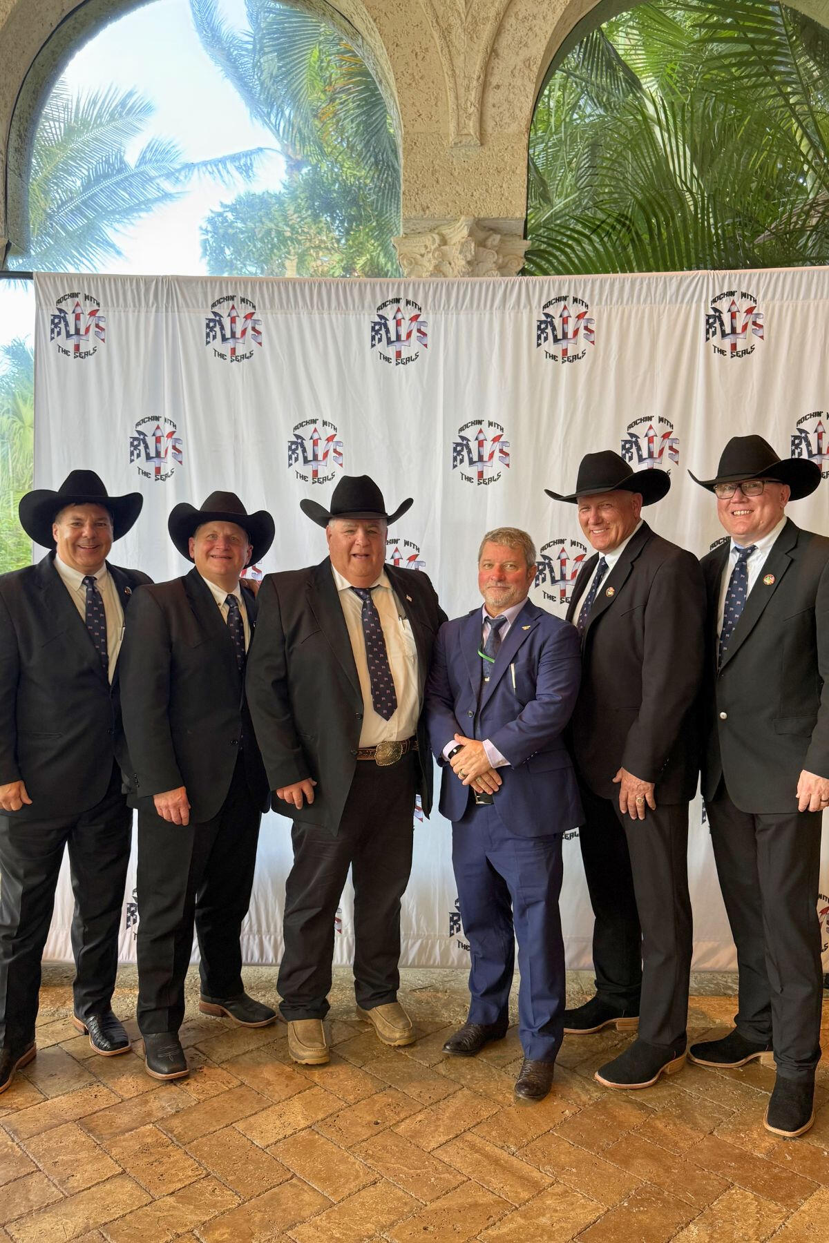 Nigro Brothers alongside Navy SEAL during a charity fundraiser event